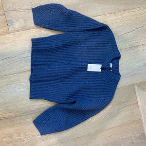 Apiece-apart sweater